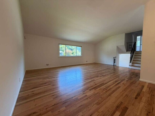 Building Photo - Spacious 4-Bedroom Home with Functional Layout, Backyard Access & Attached Garage