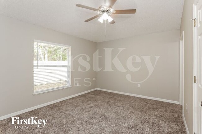 Building Photo - 6671 Gentle Oaks Dr N