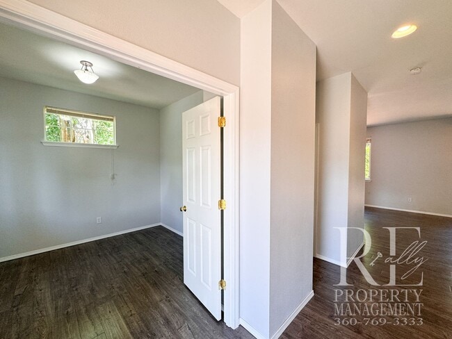 Building Photo - Dual Primary Suites, Huge Backyard Deck & Sun-Filled Living Spaces Near Everyday Conveniences