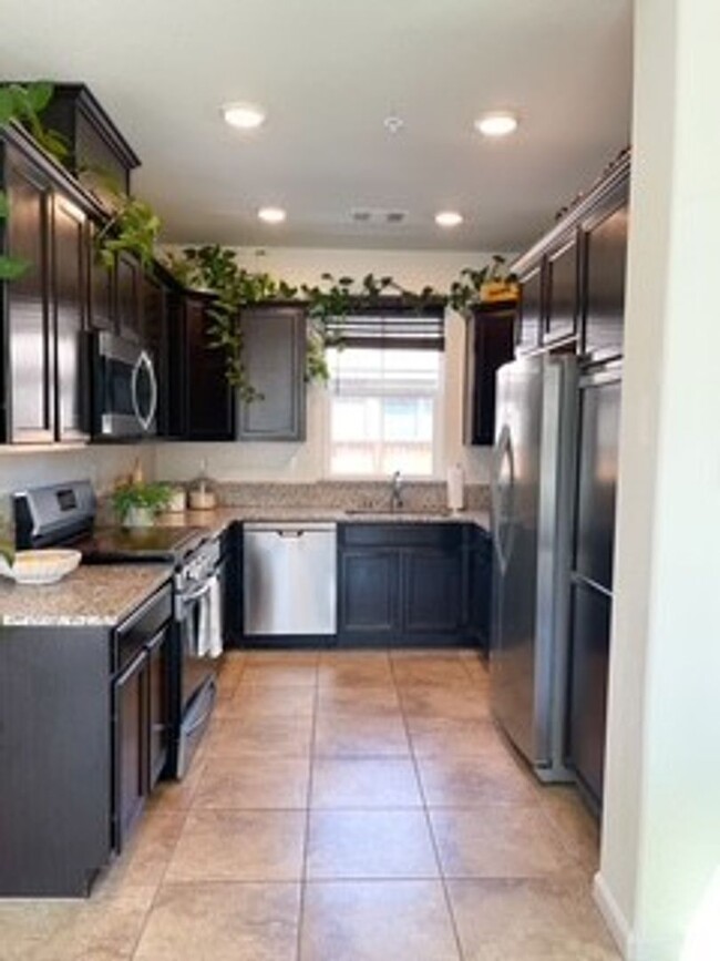 Building Photo - Three Bedroom E. Sparks Home