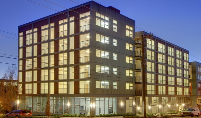 Building Photo - Stylish Urban Living with Sustainable Comf...