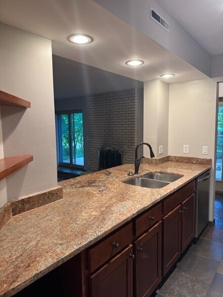 Kitchen Open to Living Room with bar area - 15931 18th Pl N