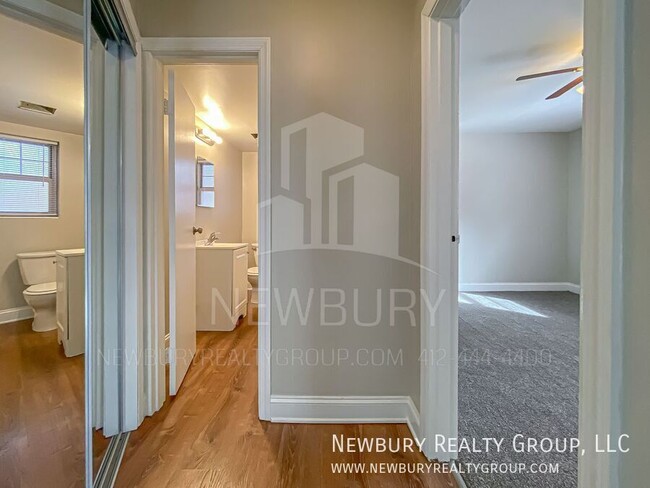 Building Photo - Modern One-Bedroom Apartment in Port Vue: ...