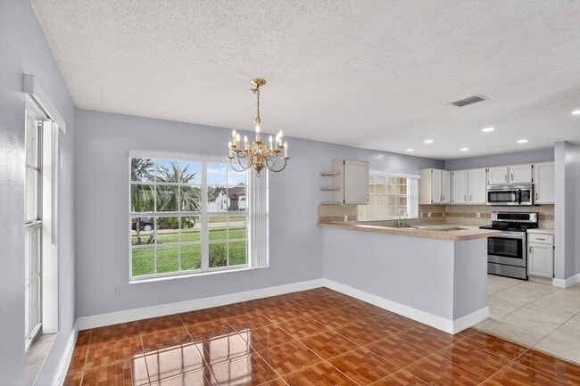 Building Photo - 14912 White Magnolia Ct