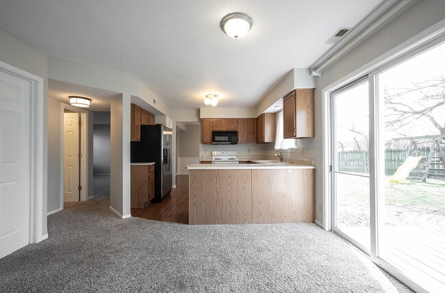 Building Photo - "Spacious 4-Bedroom Retreat with 2.5 Baths...