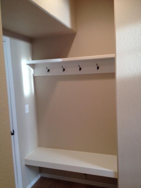 seating area and coat rack off garage - 2786 Exmoor Ln