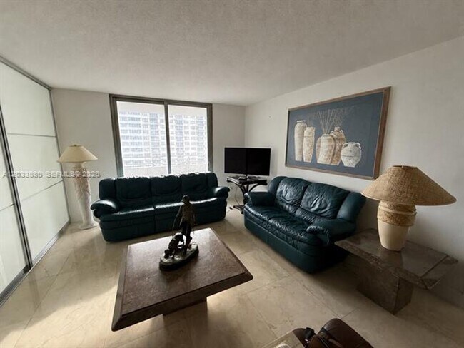 Building Photo - 5555 Collins Ave