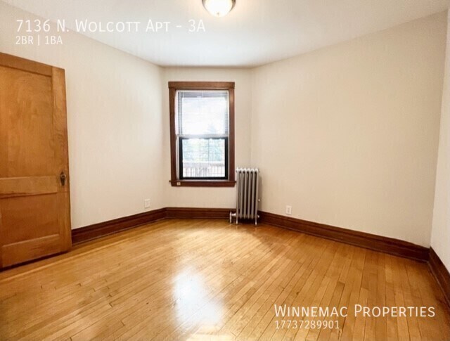 Building Photo - 7136 N Wolcott Ave