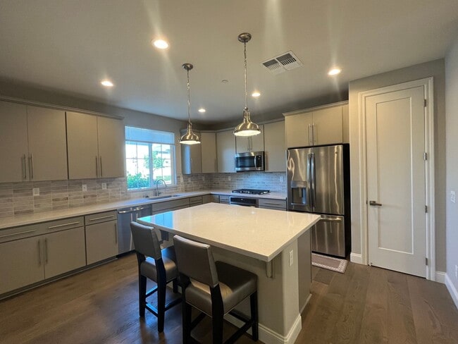 Building Photo - PURE Property Management Presents: Your Gateway to Elevated Living in the Coveted Twin Creeks Par...