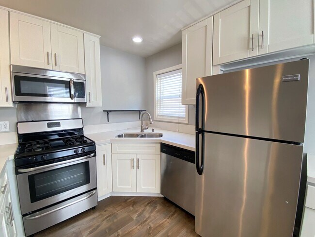 Building Photo - Prime North Park Living – Stylish Upstairs Corner 1-Bedroom!