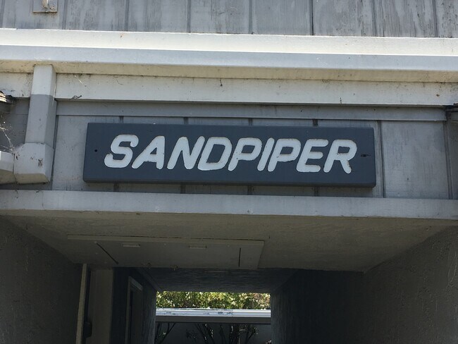 Building Photo - Cozy Studio by the Beach in Sandpiper III Complex!