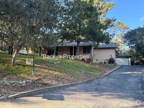 Building Photo - Wonderful one level home surrounded by trees