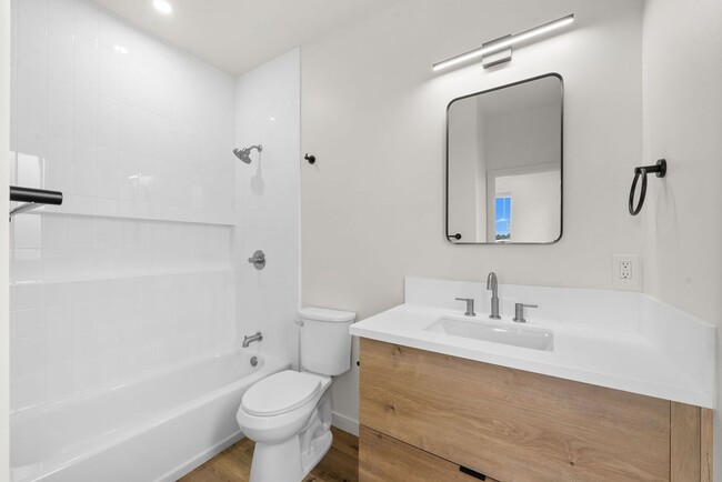 Building Photo - Introducing a stunning newly constructed t...
