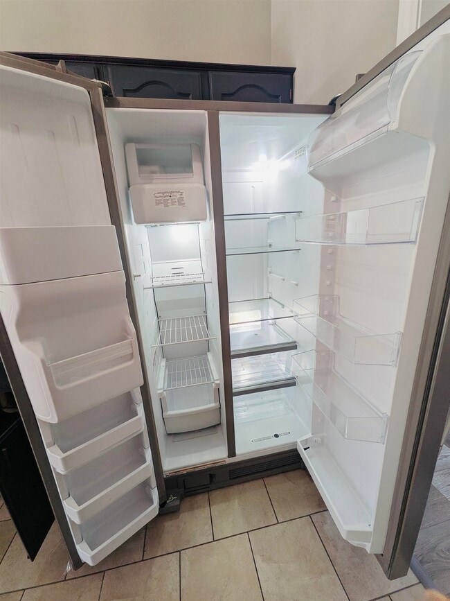 Building Photo - 9410 Garden Woods Dr