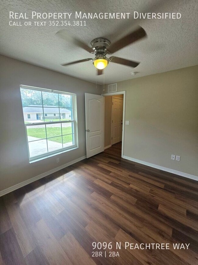 Building Photo - 9096 N Peachtree Way