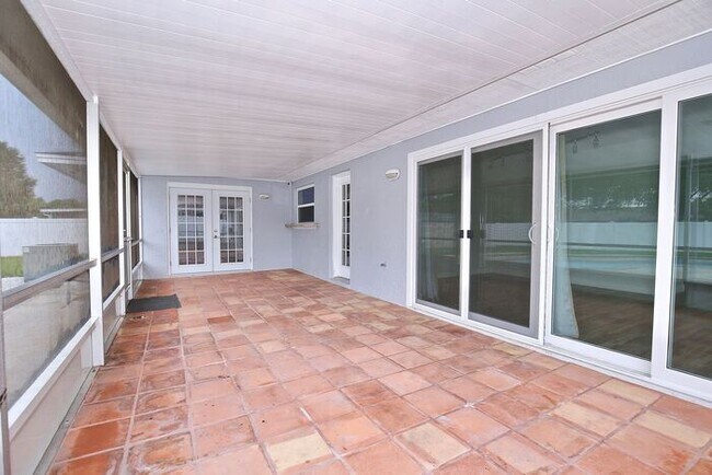 Building Photo - Gorgeous 4/2 Pool Home with a Covered Patio and a Large Fenced Backyard Located in Dr. Phillip's ...