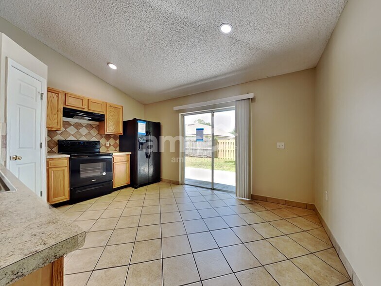 Building Photo - 7287 Lawn Tennis Ln