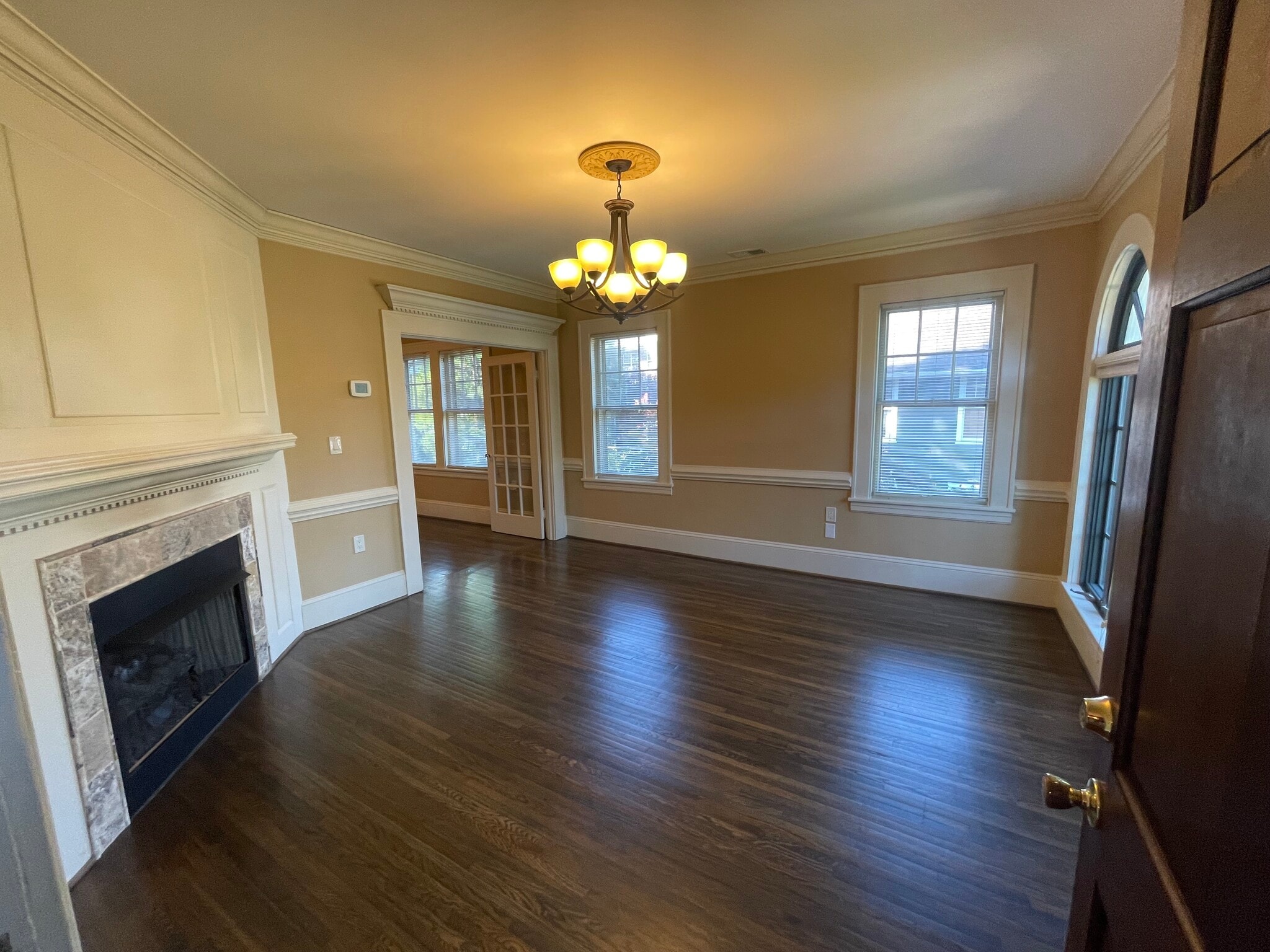 very large living room with crown mold and chair rail mold - 418 Clement Ave
