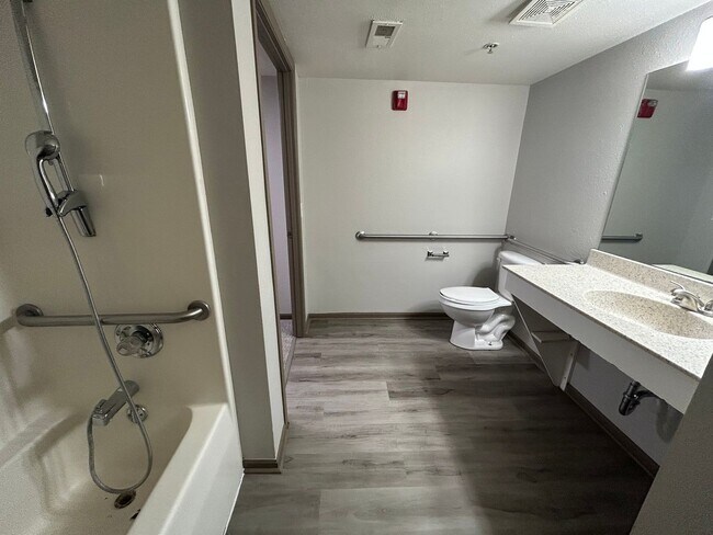 Building Photo - Solid surface countertops, stainless steel...