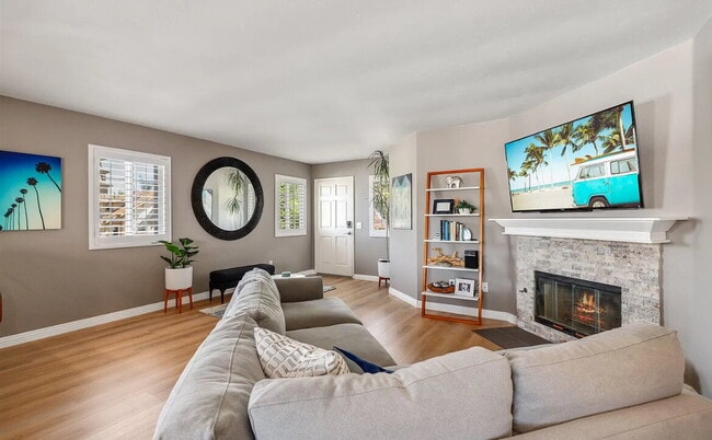 Building Photo - This quaint, gated complex is located on a...