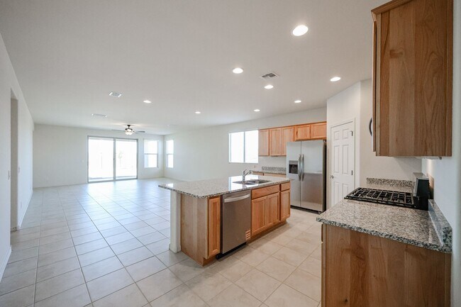 Building Photo - New 4 Bedroom + Den Home in Asante Community