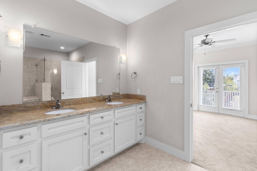 Double sink and cabinets, large mirror - 1221 W 23rd St