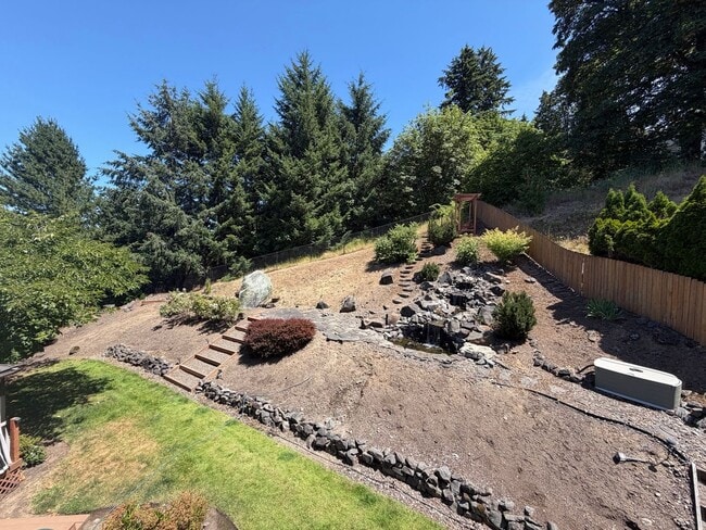 Building Photo - Light-Filled 3 Bedroom Retreat with Waterfall & Fully Fenced Yard