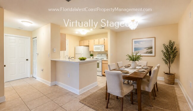 Building Photo - MOVE IN READY! LARGE 2 BEDROOM/2 BATH PLUS ATTACHED GARAGE! TILE/LVP THROUGHOUT!