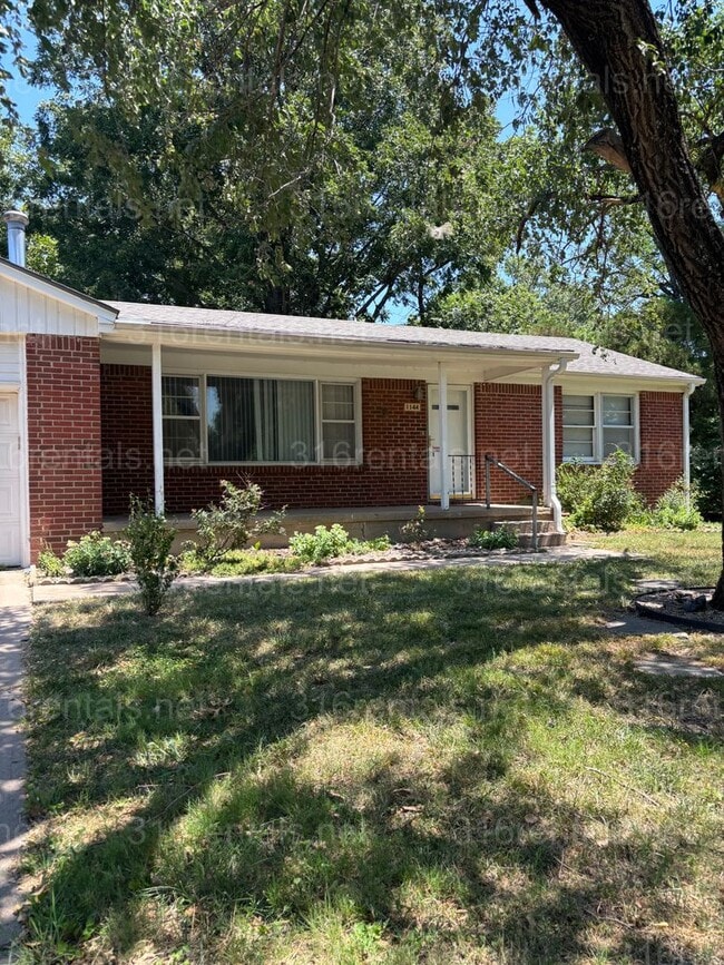 Building Photo - Three bedroom one bath house available now!