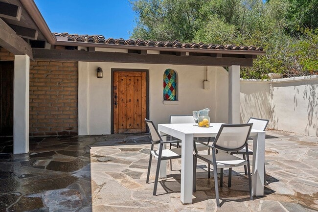 Building Photo - This Beautiful Hacienda Style Home combine...