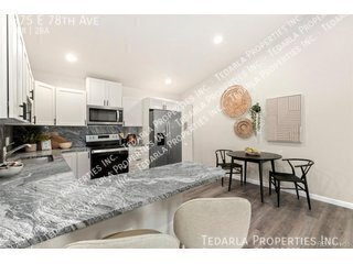 Building Photo - 875 E 78th Ave