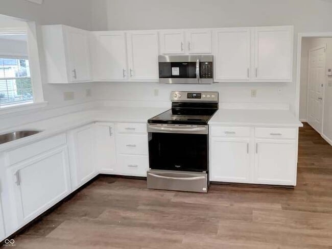 Building Photo - 6614 Sparrowood Dr