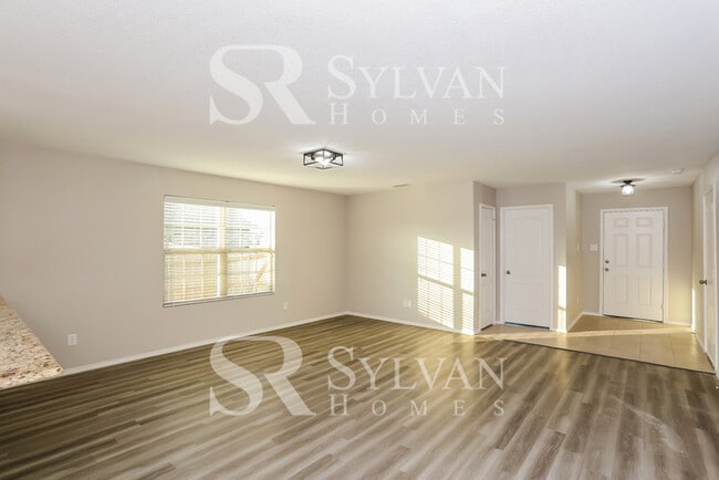 Building Photo - Fall in love with this beautifully maintained 4BR 2BA brick home