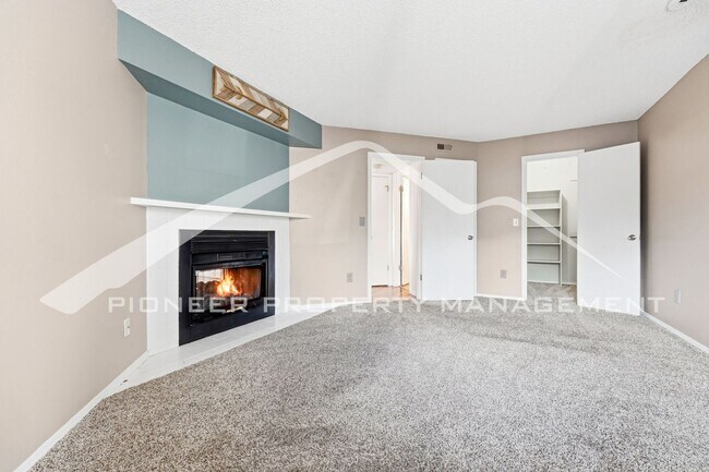 Building Photo - Charming Condo with Washer/Dryer and Gas Fireplace