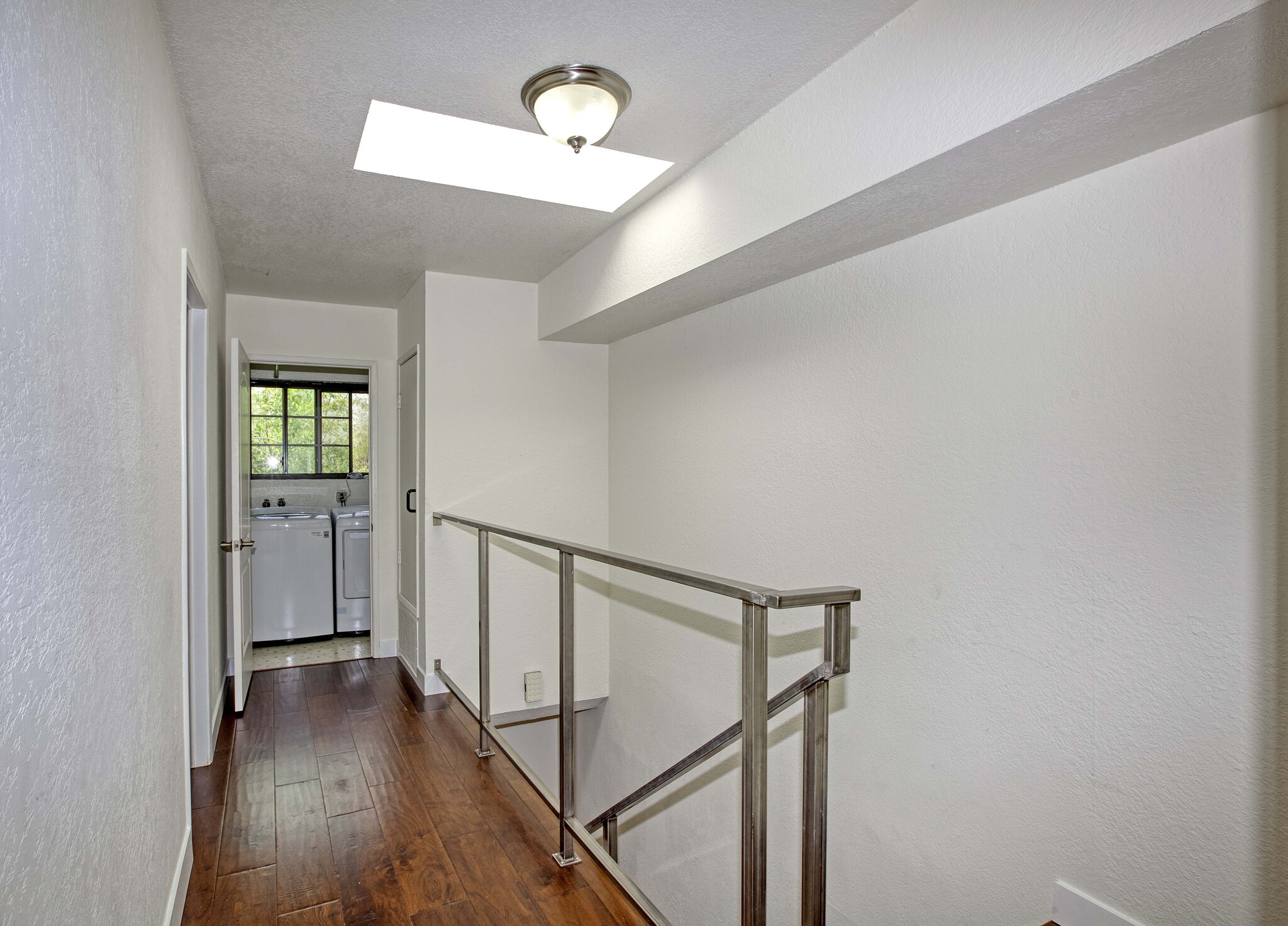 Upstairs landing, view of washer/dryer - 1833 11th St