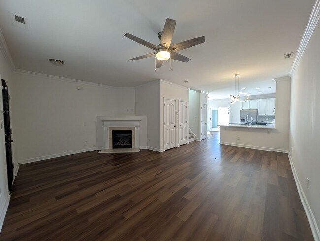 Building Photo - Pristine End Unit Townhome located in the Prosperity Place community!