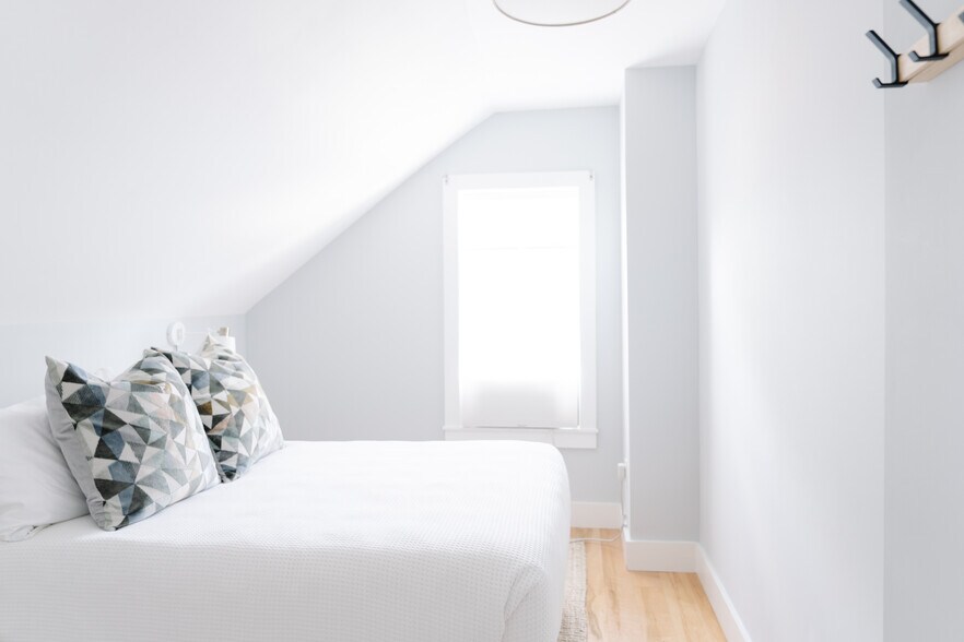 Second bedroom shown with queen bed - 80 Maple St