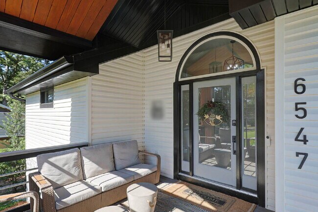 Building Photo - COMING SOON · Designer Renovation · Covered Deck Pavilion · 2-Car Garage · Lawn Care Included