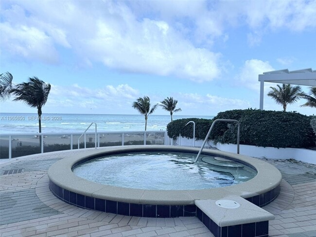 Building Photo - 18201 Collins Ave