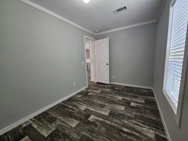 Building Photo - 6661 Hidden Oaks Dr