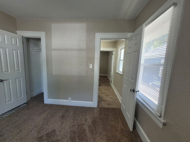 Building Photo - Two bedroom, One Bathroom Home with Partially fenced back yard