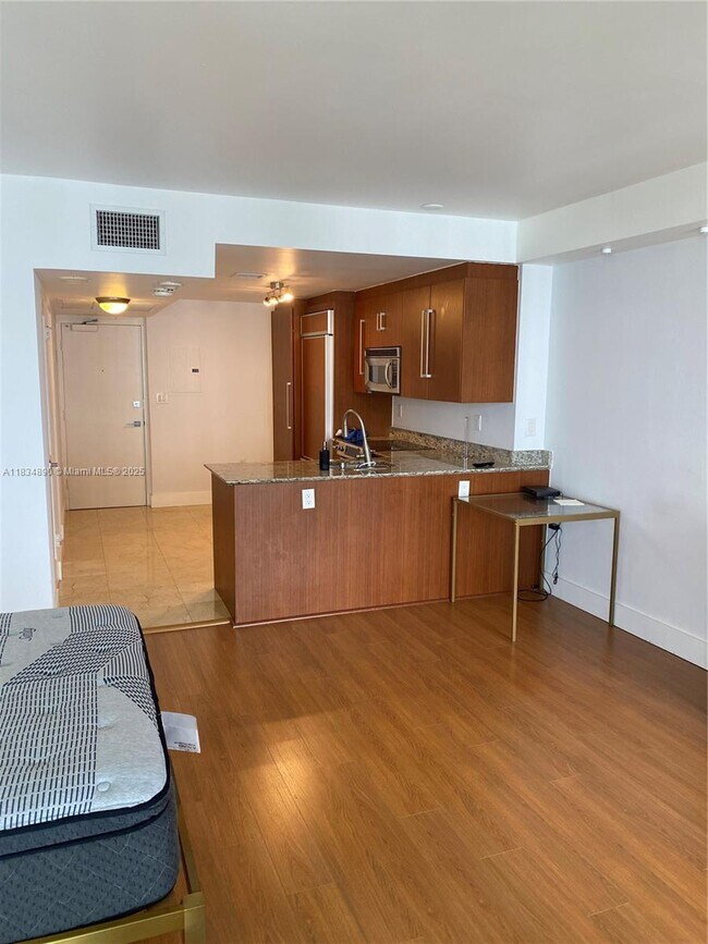 Building Photo - 10275 Collins Ave