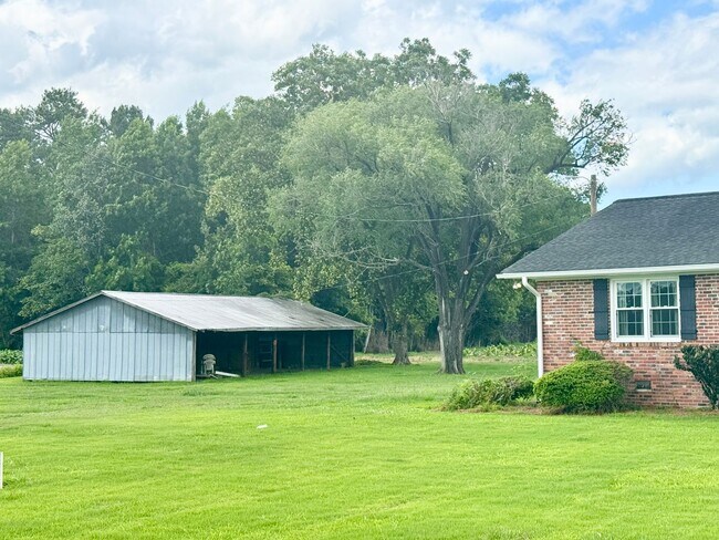 Building Photo - Hard-to-Find Home with Garage & Detached Shed & Modern Updates