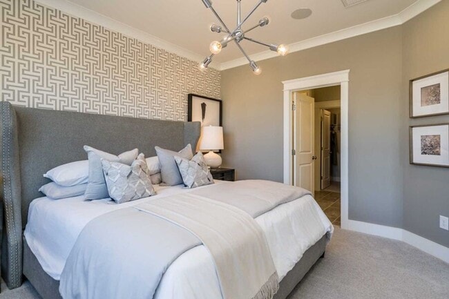 Building Photo - 3 Bedroom 2.5 Bathroom End Unit Townhome w/ 1st Floor Owners Suite and a 2 car Garage in the hear...