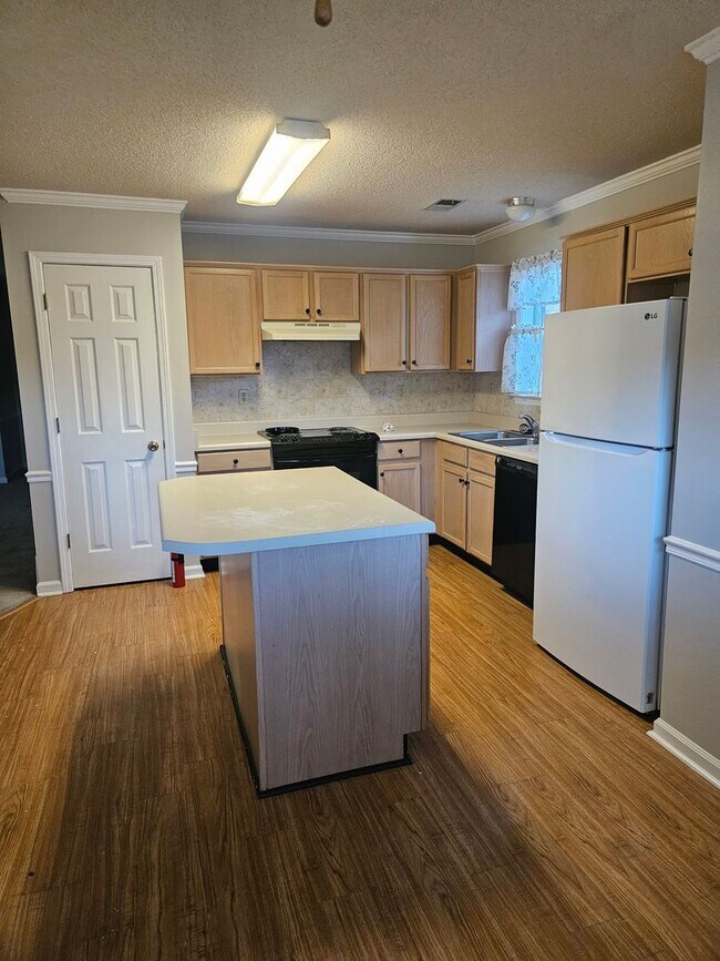 Building Photo - Available Now!   half off first months ren...