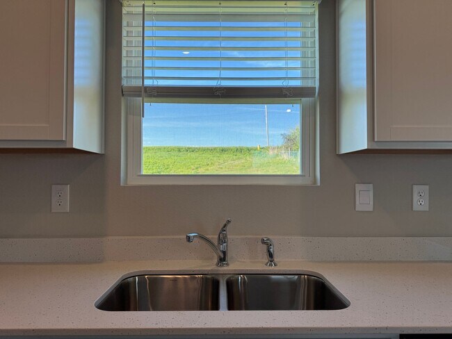 Building Photo - Spacious 4-Bedroom Split-Level Near Standing Bear Lake & Trails
