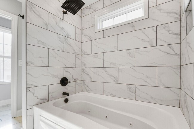 Building Photo - Pet Friendly Four Bedroom with Basement!