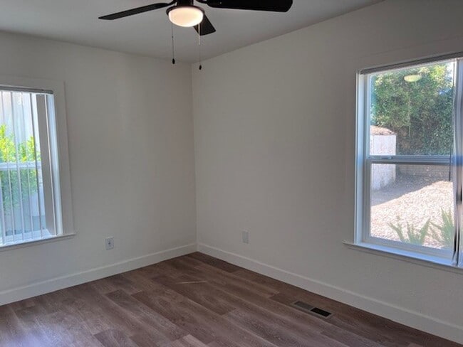 Building Photo - Beautiful Land Park home with fresh paint and new flooring throughout.