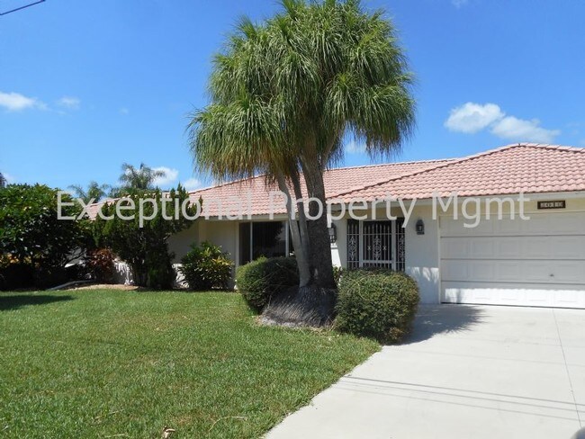 Building Photo - Spacious Home with Luxurious Primary Suite + Den on Oversized Gulf Access Lot!