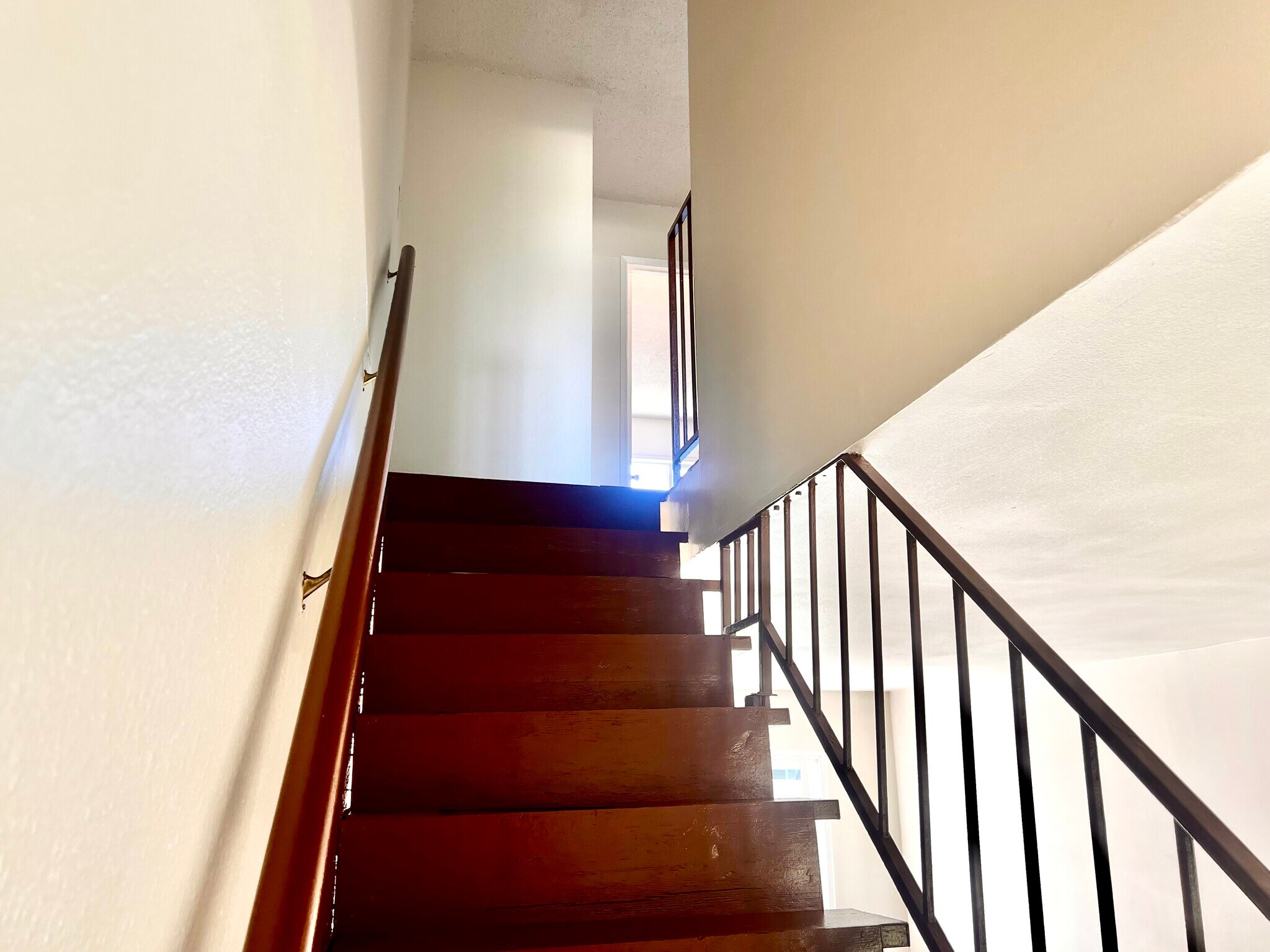 View upstairs to bedrooms with full bathroom and closet - 619 W Provential Dr